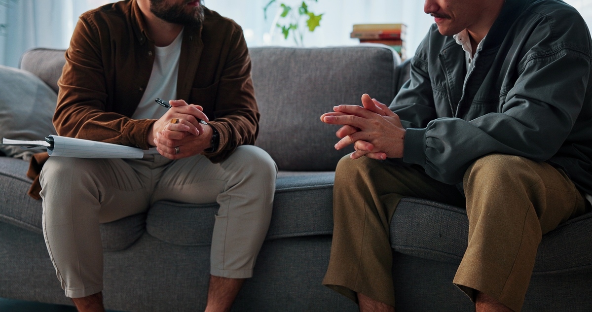Man discussing stress and testosterone levels with a provider in Norfolk VA