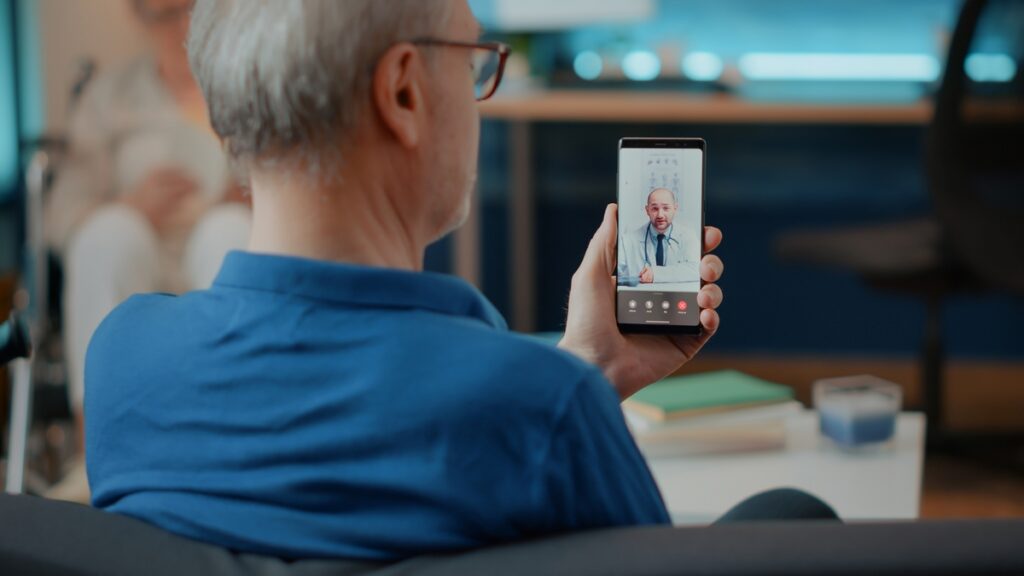 TRT in South Carolina telehealth visit, man on a video call with his doctor from his phone